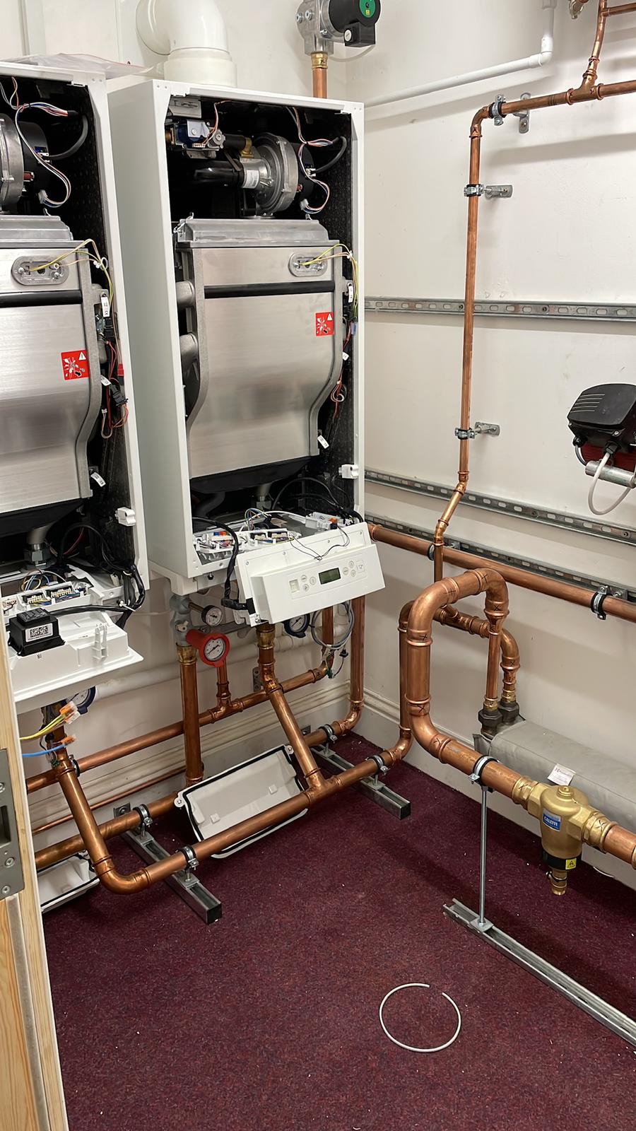  
Boiler maintenance being performed by Lucas Plumbing & Heating