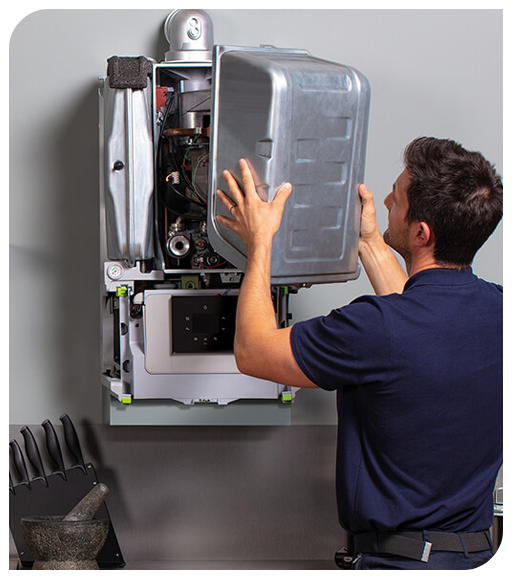 Heating engineer servicing a gas boiler in Wokingham home