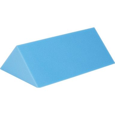 Blue foam wedge, used as a support.