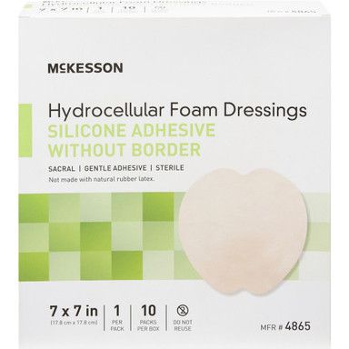 Box of McKesson hydrocellular foam dressings with a silicone adhesive, featuring a sacral shape.