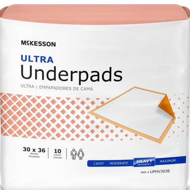 McKesson Ultra Underpads package, white with peach accents, reads 