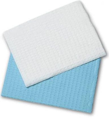 White and blue waffle weave dental bibs, slightly overlapping.