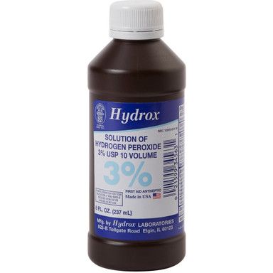 Bottle of Hydrox hydrogen peroxide solution (3%) with white cap and blue/white label.