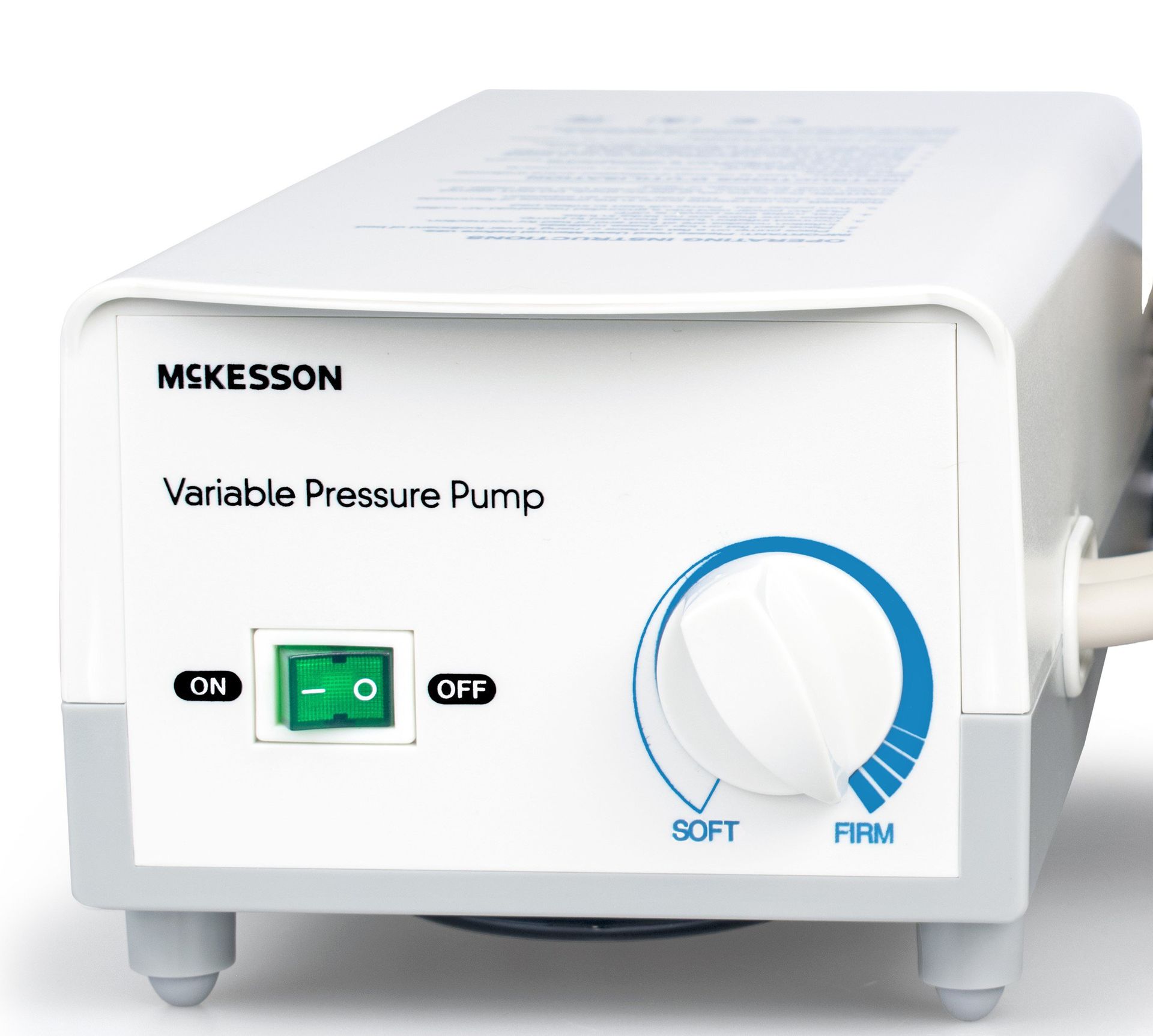 White McKesson variable pressure pump with on/off switch and soft/firm dial.