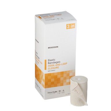 Box of McKesson elastic bandages with a rolled bandage next to it.