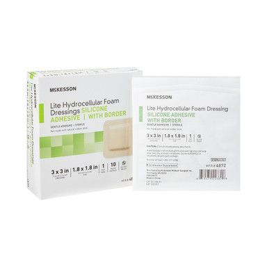 Box and individual packet of McKesson Lite Hydrocellular Foam Dressings with silicone adhesive and border.