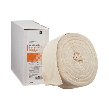 Box of tubular stockinette bandage with a roll of bandage beside it. Beige color.