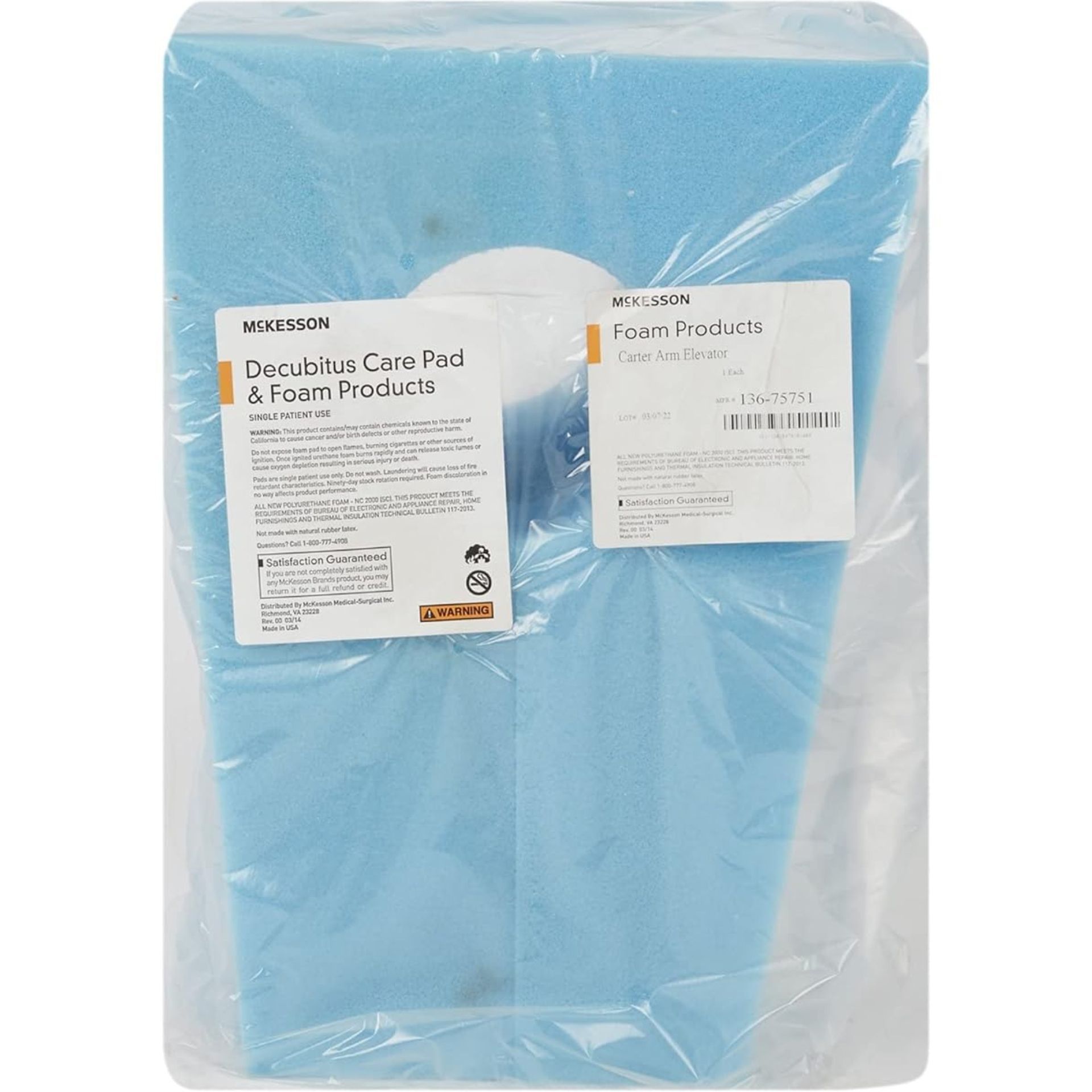 Blue Decubitus Care Pad in clear plastic wrapping.