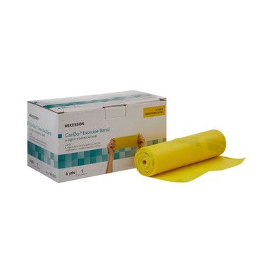 Box of yellow CanDo exercise band rolls with a single roll unrolled.