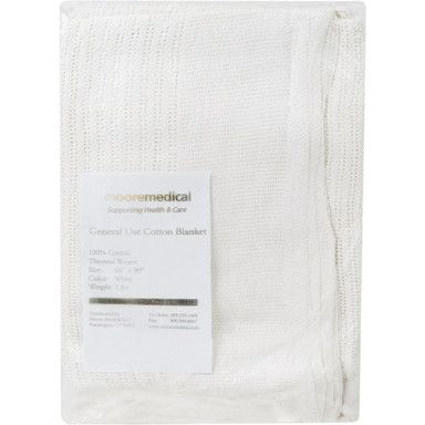 White disposable cotton blanket with product label.