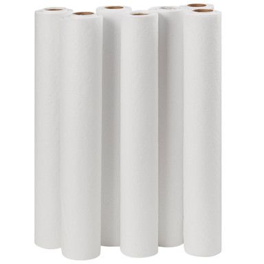 Seven white paper towel rolls stacked together.
