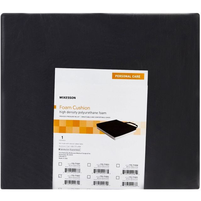 Black foam cushion with a white product label.