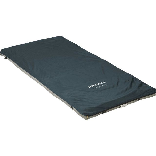 Dark blue camping mattress on a light gray frame, angled view.