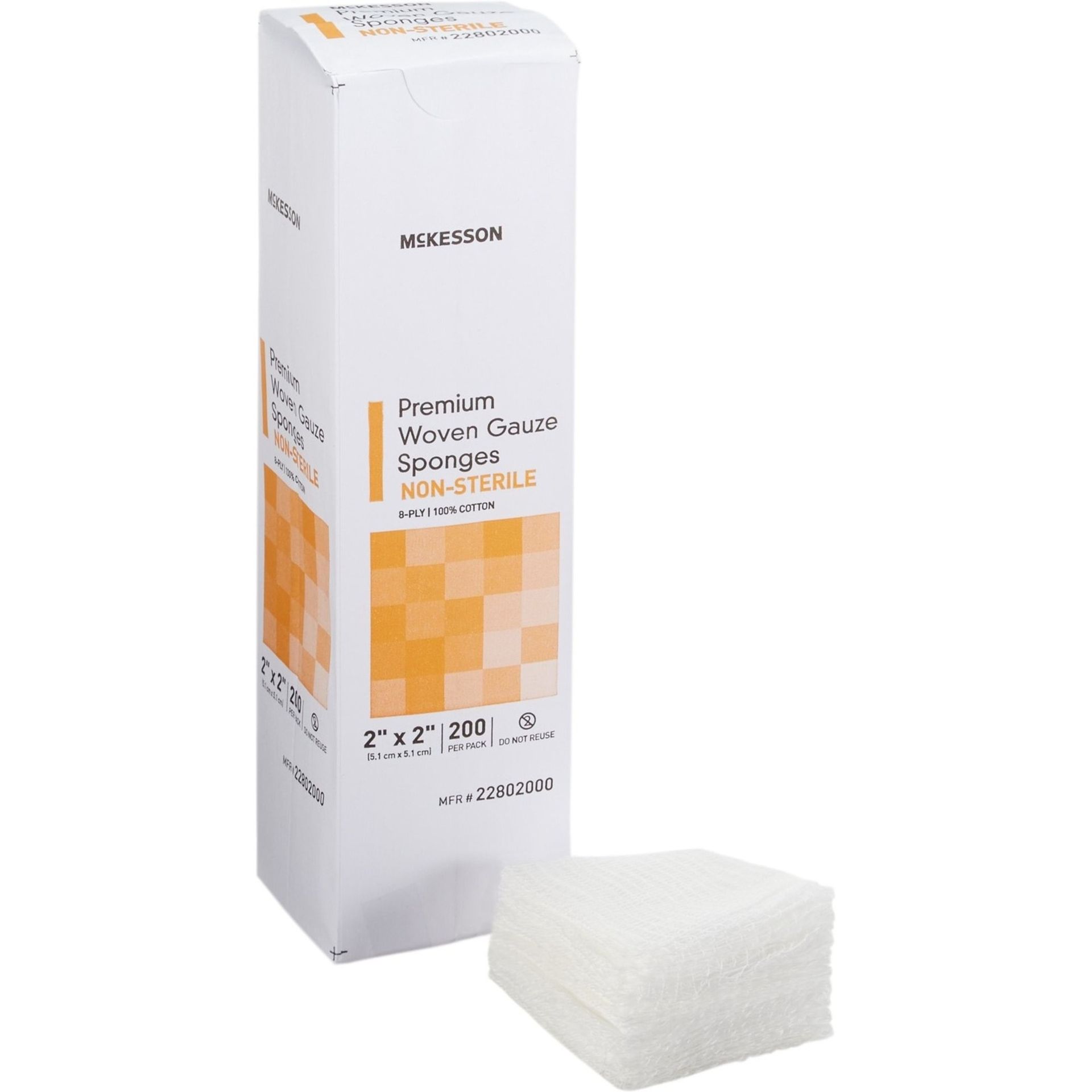 Box of medical gauze sponges with a stack of sponges in front.