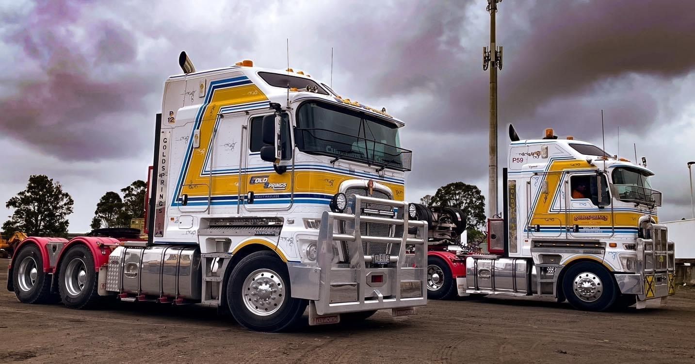 Trucks parked side by side