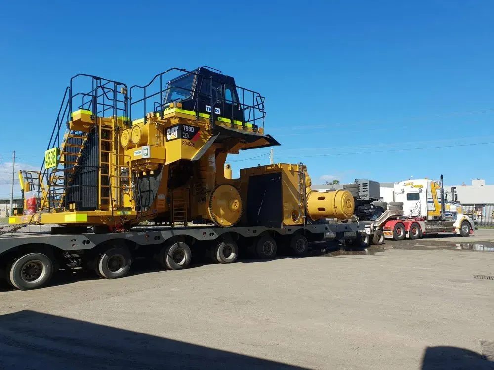 Big Yellow Machine Loaded on the Truck — Rutherford, NSW — Goldsprings Heavy Haulage