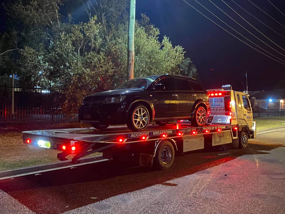 Vehicle Being Towed at Night Time — Towing in Kempsey