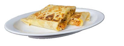 Two folded quesadillas on a white plate.