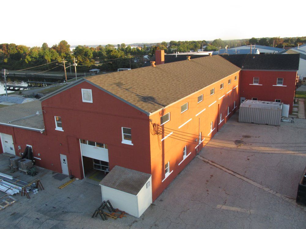 An aerial view of a large red building