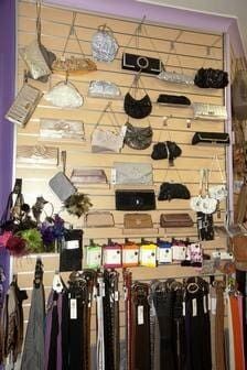 A Wall Filled With Handbags And Belts In A Store — Ballistic Chix In Forster, NSW
