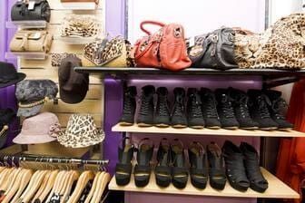 A Display Of Shoes, Hats, Handbags And Clothes In A Store — Ballistic Chix In Forster, NSW