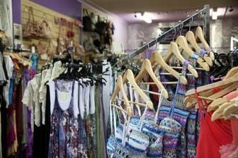 A Row Of Clothes Hanging On A Rack In A Store — Ballistic Chix In Forster, NSW