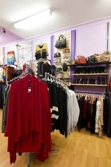 A Clothing Store With A Lot Of Clothes Hanging On Racks — Ballistic Chix In Forster, NSW