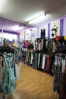 A Store Filled With Lots Of Clothes Hanging On Racks — Ballistic Chix In Forster, NSW