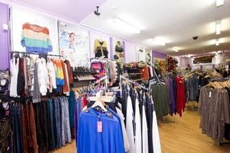 A Store Filled With Lots Of Clothes Hanging On Racks — Ballistic Chix In Forster, NSW