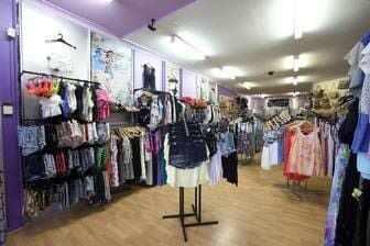 A Store Filled With Lots Of Clothes Hanging On Racks — Ballistic Chix In Forster, NSW