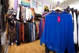 A Blue Shirt Is Hanging On A Hanger In A Clothing Store — Ballistic Chix In Forster, NSW