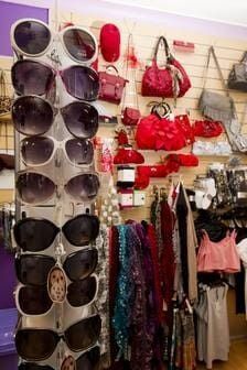 A Display Of Sunglasses And Handbags In A Store — Ballistic Chix In Forster, NSW