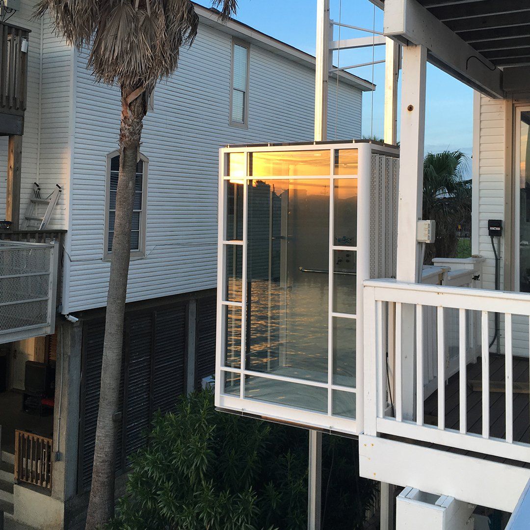 Passenger lift on the second floor of a large beach home