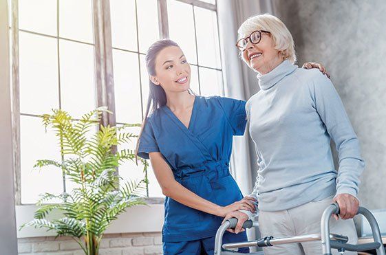 Old Woman with Caregiver — Mobile, AL — Green Disability Law
