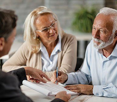 Old Couple Talking to Attorney — Mobile, AL — Green Disability Law Old Couple Talking to Attorney — Mobile, AL — Green Disability Law