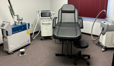 A Room With A Chair And A Machine In It - Latrobe, PA - Laser180