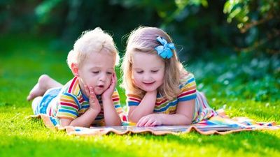 Language Development — Children Reading a Book in Cameron Park, CA