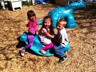 Preschool Single Springs — Three Children Riding Mini See Saw in Cameron Park, CA