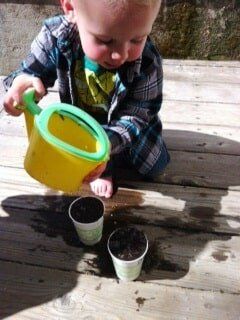 Shingle Springs — Child Watering Soil with See in Cameron Park, CA