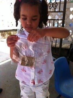 Preschool Development — Child Holding a Zip Lock Bag in Cameron Park , CA