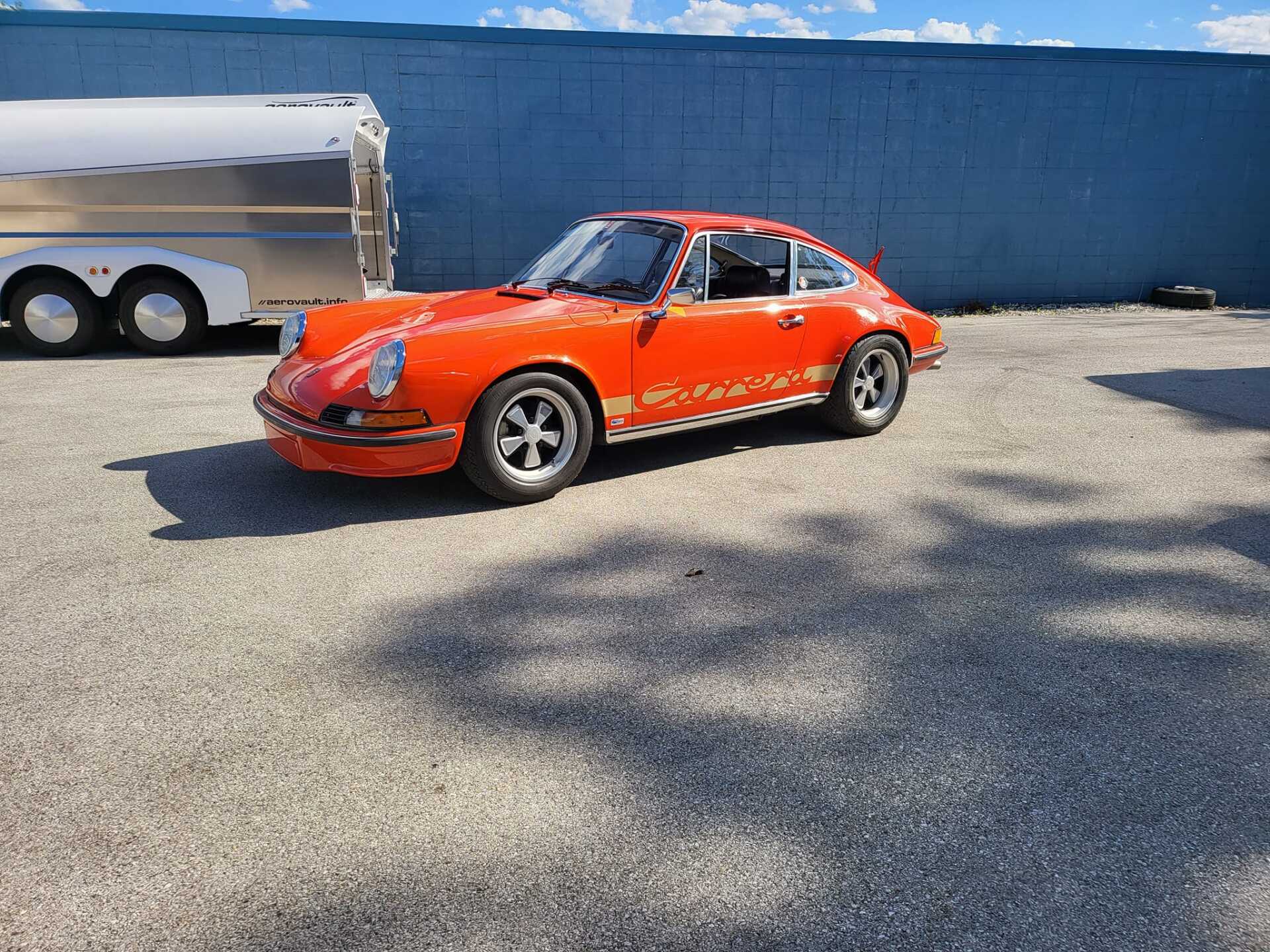 Orange Porsche 911 coupe with