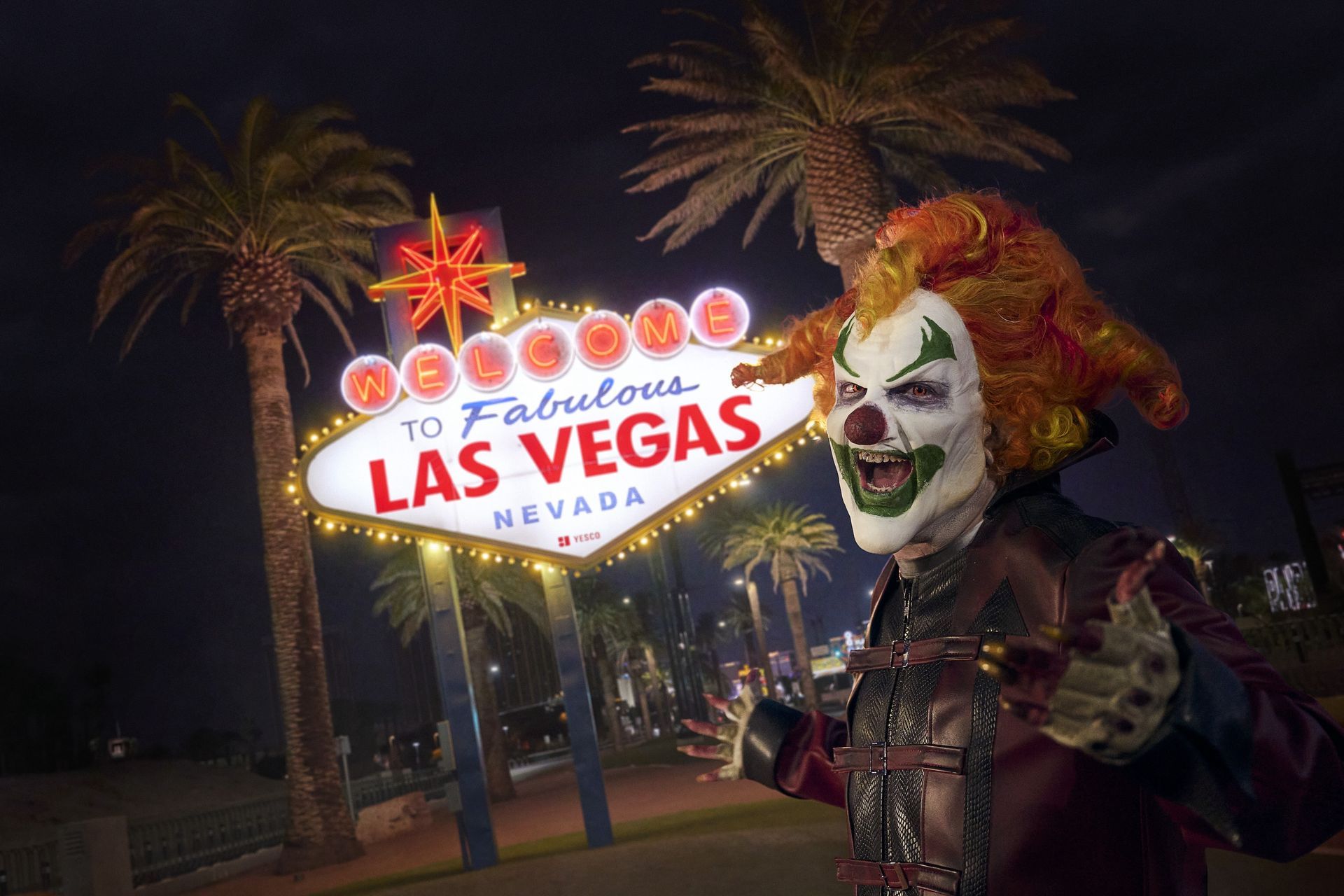 A scary clown in front of the