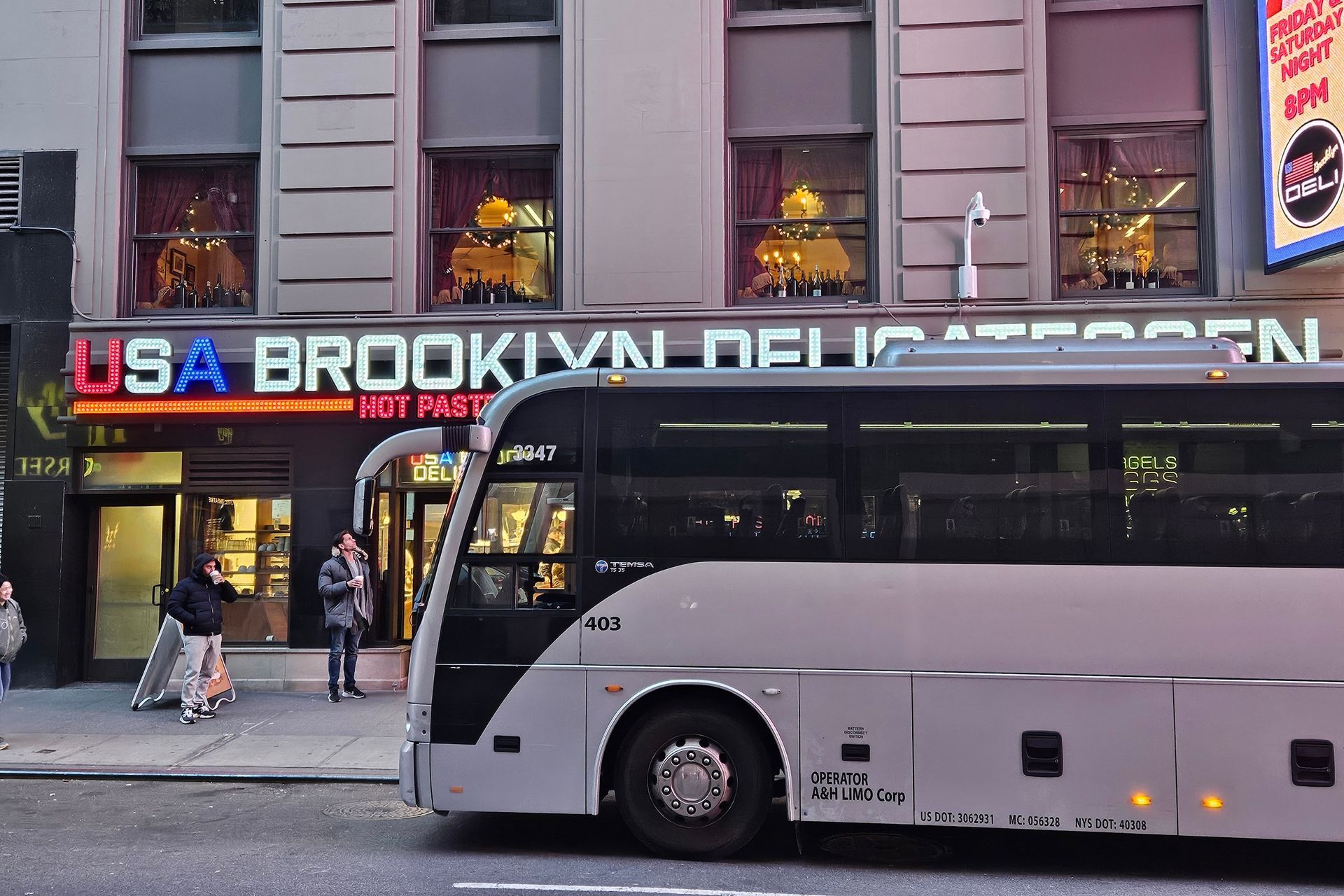 A tour bus parked in front of 