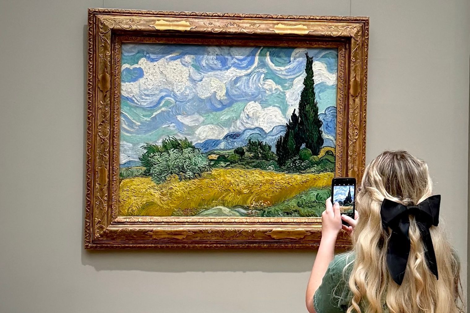 Woman taking photo of Van Gogh's 