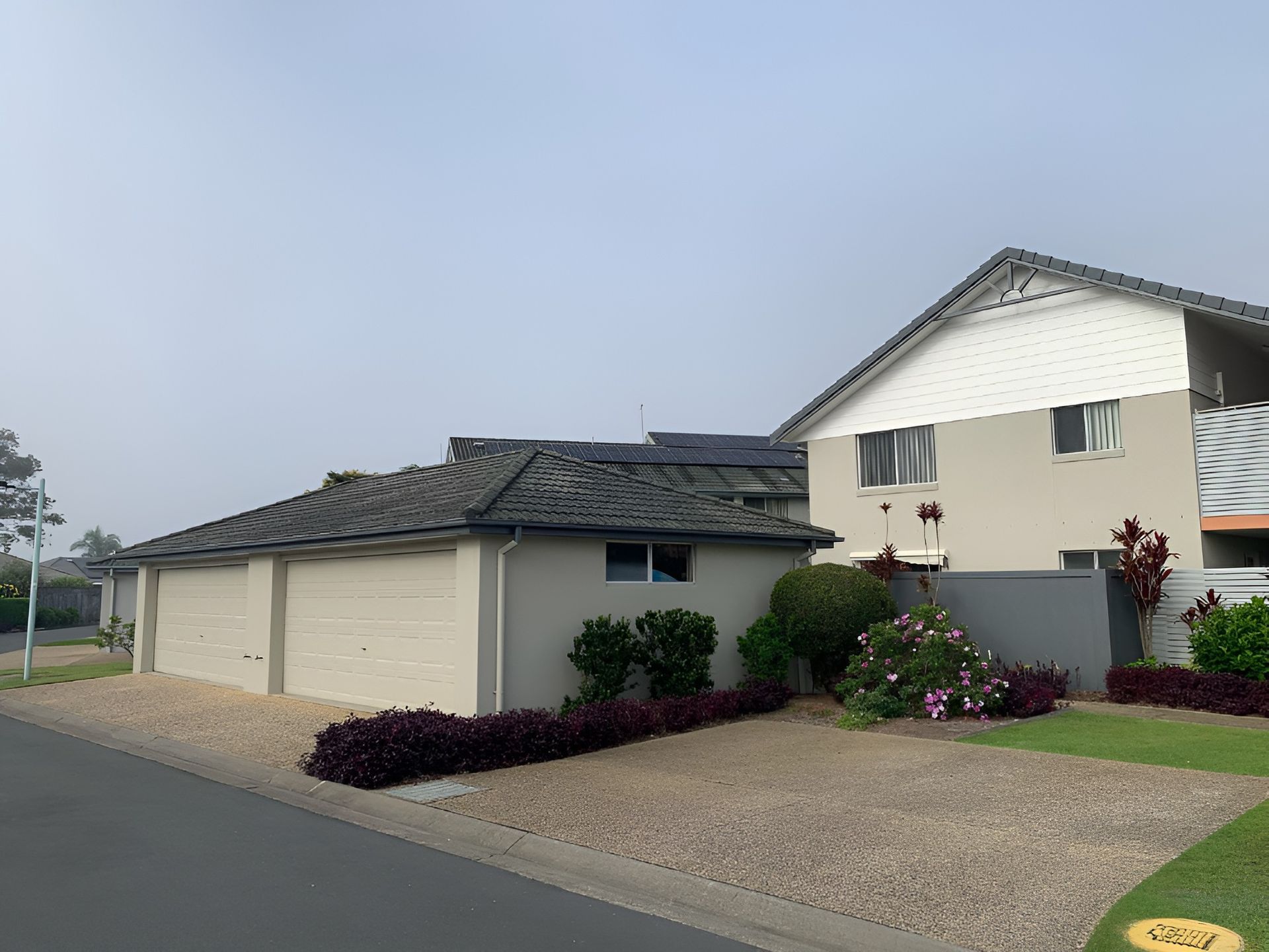 A White House With a Blue Sky in the Background — Holster Painting Contractors In Port Macquarie, NSW