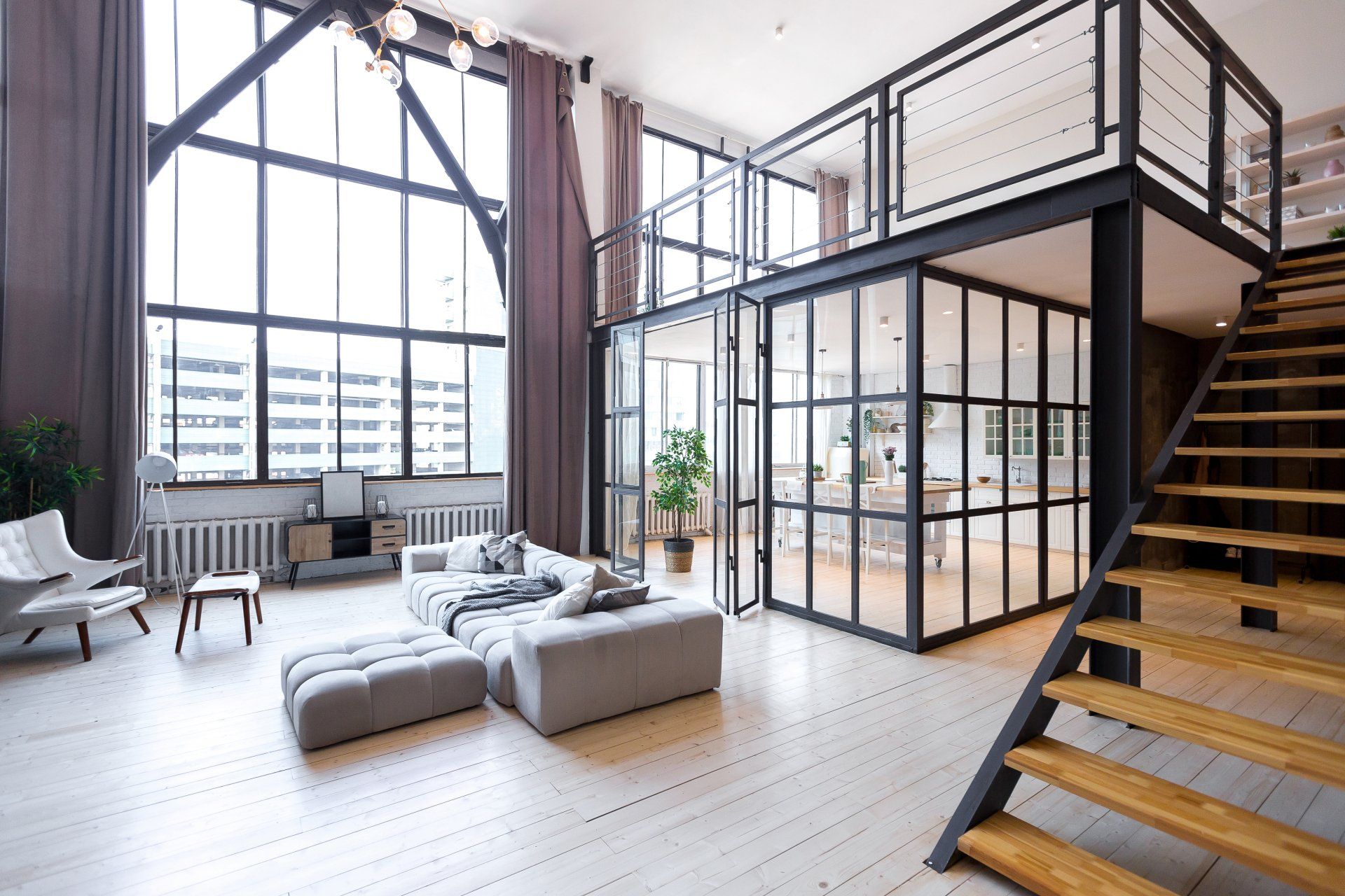 trendy modern design two-level apartment with large high windows.