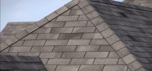 A close up of a roof with shingles on it