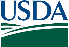 The usda logo is a green and blue logo with a field in the background.