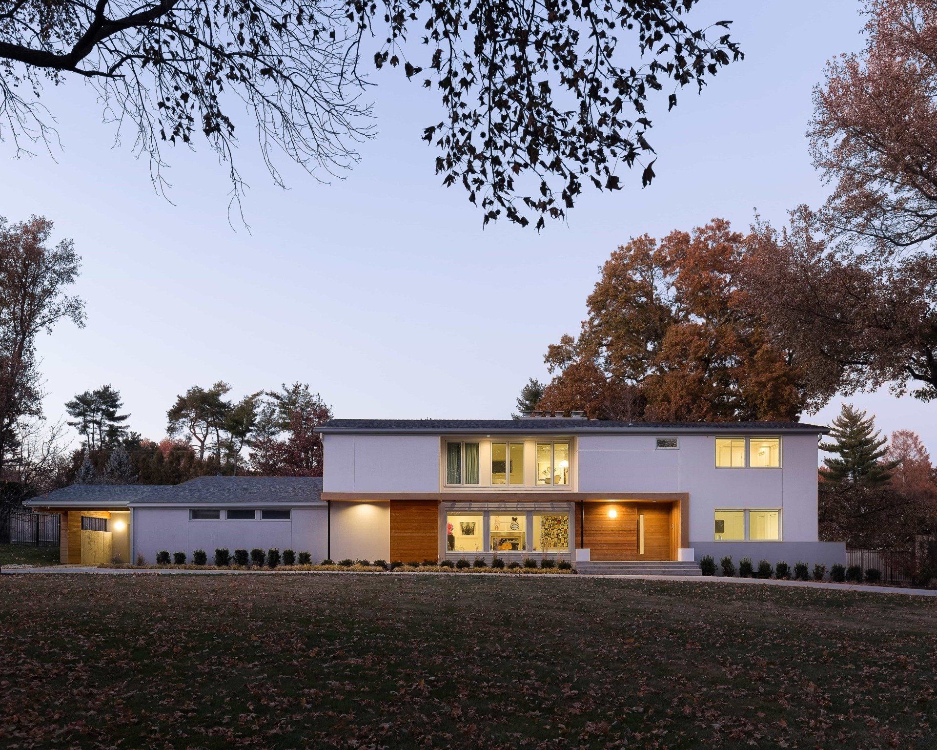 Refinished mid-century modern home with wood accents on entryway