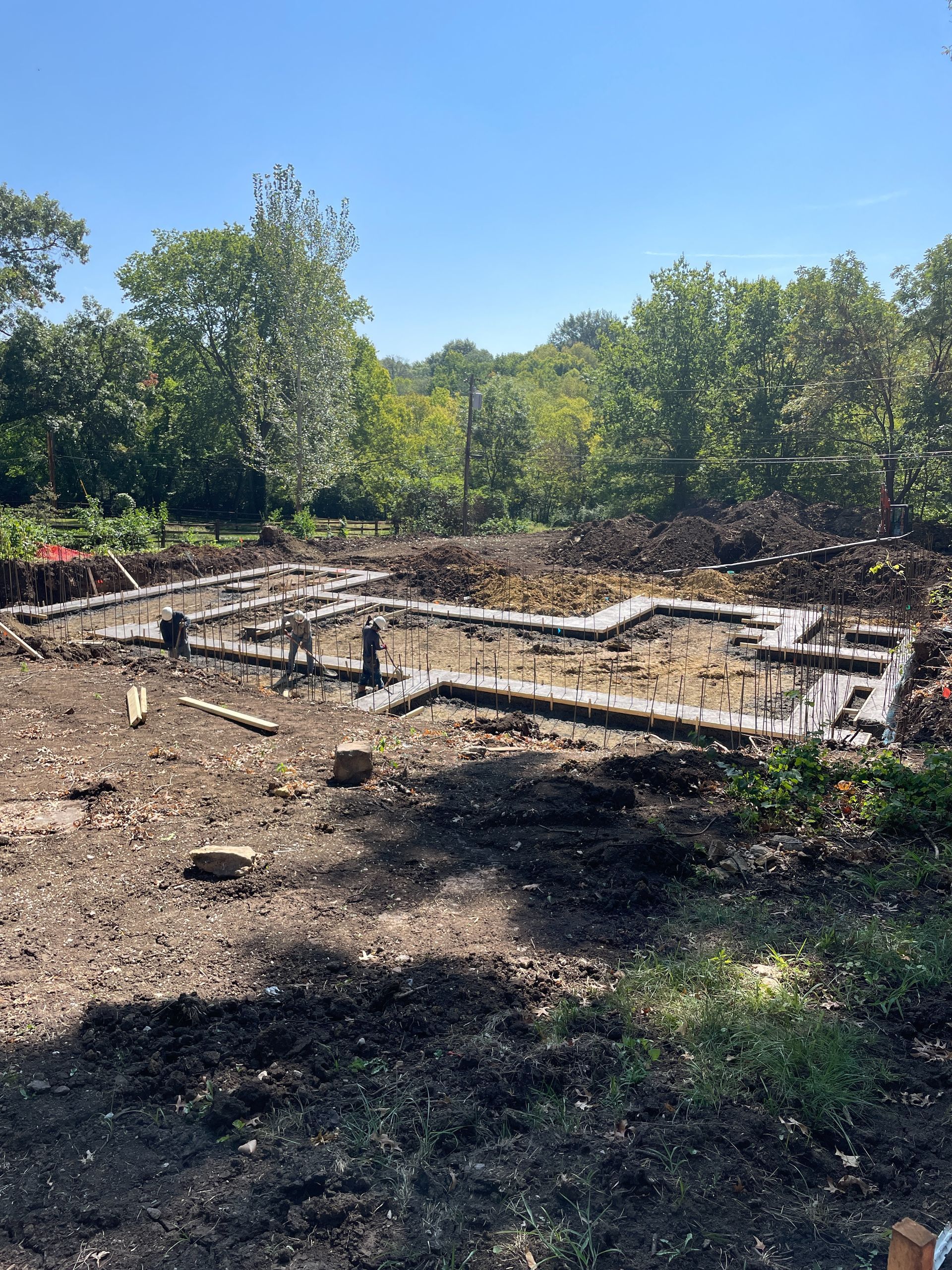 Construction site with foundation footings poured